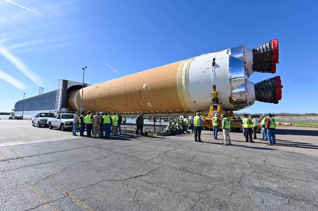 These images show how teams rolled out, or moved, the completed core stage for NASA’s Space Launch System rocket from NASA’s Michoud Assembly Facility in New Orleans. Crews moved the flight hardware for the first Artemis mission to NASA’s Pegasus barge on Jan. 8 in preparation for the core stage Green Run test series at NASA’s Stennis Space Center near Bay St. Louis, Mississippi. Pegasus, which was modified to ferry SLS rocket hardware, will transport the core stage from Michoud to Stennis for the comprehensive core stage Green Run test series. Once at Stennis, the Artemis rocket stage will be loaded into the B-2 Test Stand for the core stage Green Run test series. The comprehensive test campaign will progressively bring the entire core stage, including its avionics and engines, to life for the first time to verify the stage is fit for flight ahead of the launch of Artemis I.  Assembly and integration of the core stage and its four RS-25 engines has been a collaborative, multistep process for NASA and its partners Boeing, the core stage lead contractor, and Aerojet Rocketdyne, the RS-25 engines lead contractor. Together with four RS-25 engines, the rocket’s massive 212-foot-tall core stage — the largest stage NASA has ever built — and its twin solid rocket boosters will produce 8.8 million pounds of thrust to send NASA’s Orion spacecraft, astronauts and supplies beyond Earth’s orbit to the Moon and, ultimately, Mars. Offering more payload mass, volume capability and energy to speed missions through space, the SLS rocket, along with NASA’s Gateway in lunar orbit and Orion, is part of NASA’s backbone for deep space exploration and the Artemis lunar program.